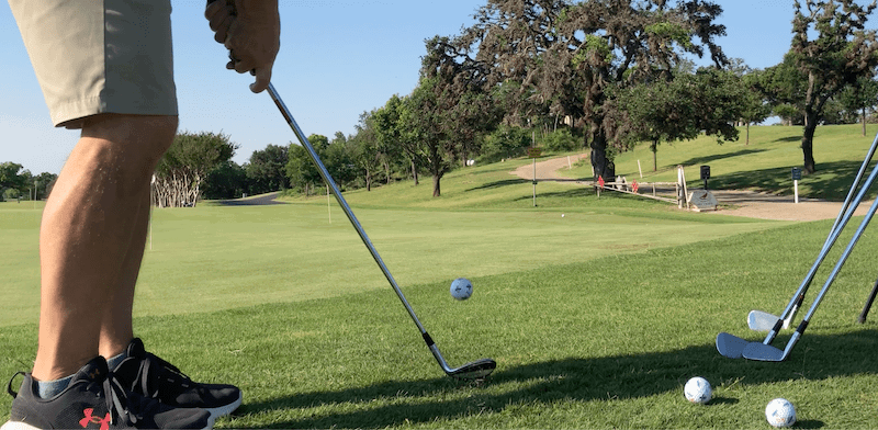 Golfer Geek Chipping Away