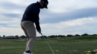 Golfer Geek at Impact with a Cobra Darkspeed Iron